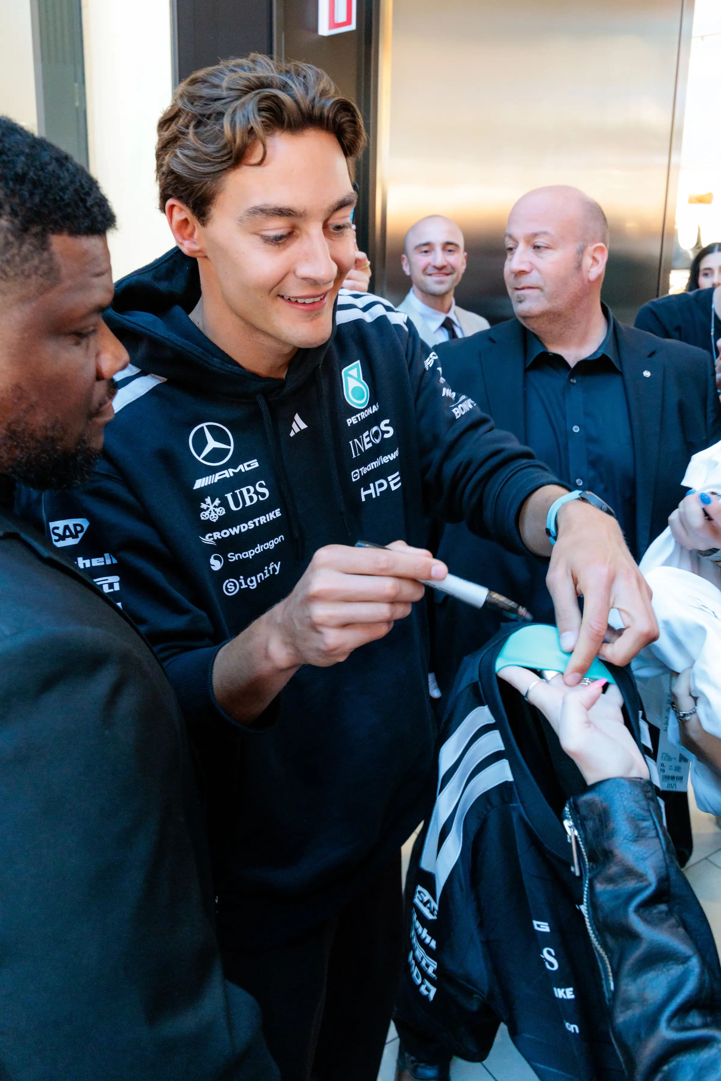 IWC x George Russell — George Russell signing at the boutique