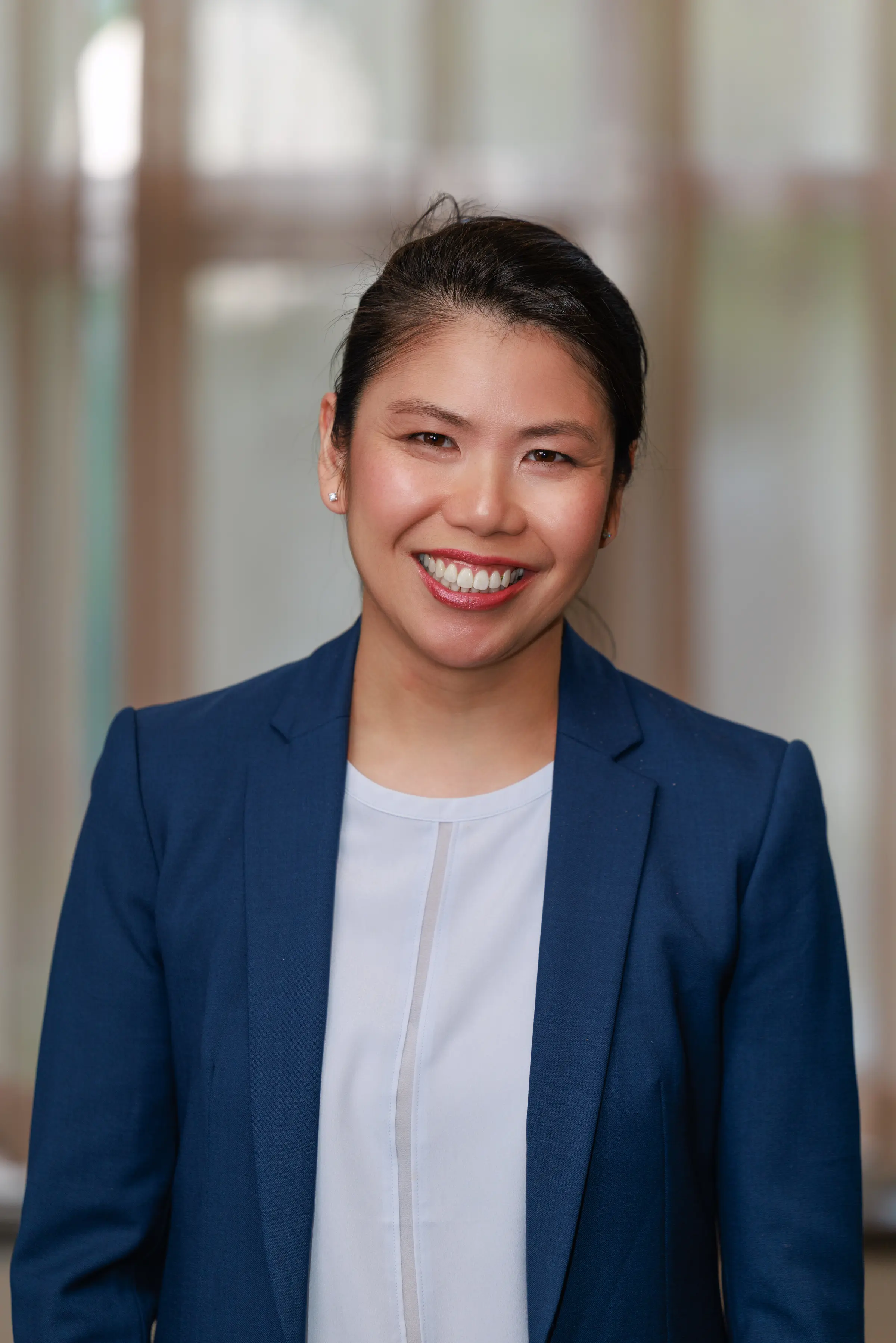 Corporate Headshots, CSOHNS - blurred window, navy blazer