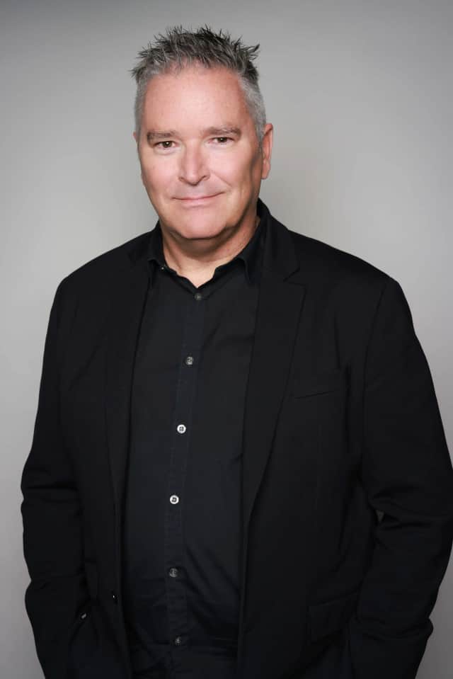 Corporate Headshots, Kenvue - studio backdrop, black jacket