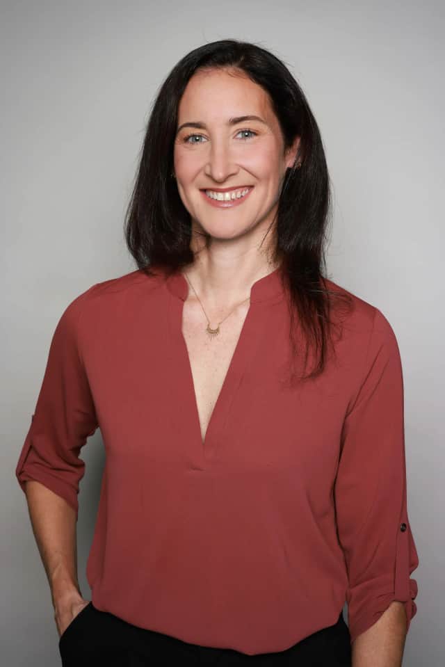 Corporate Headshots, Kenvue - studio backdrop, rust blouse