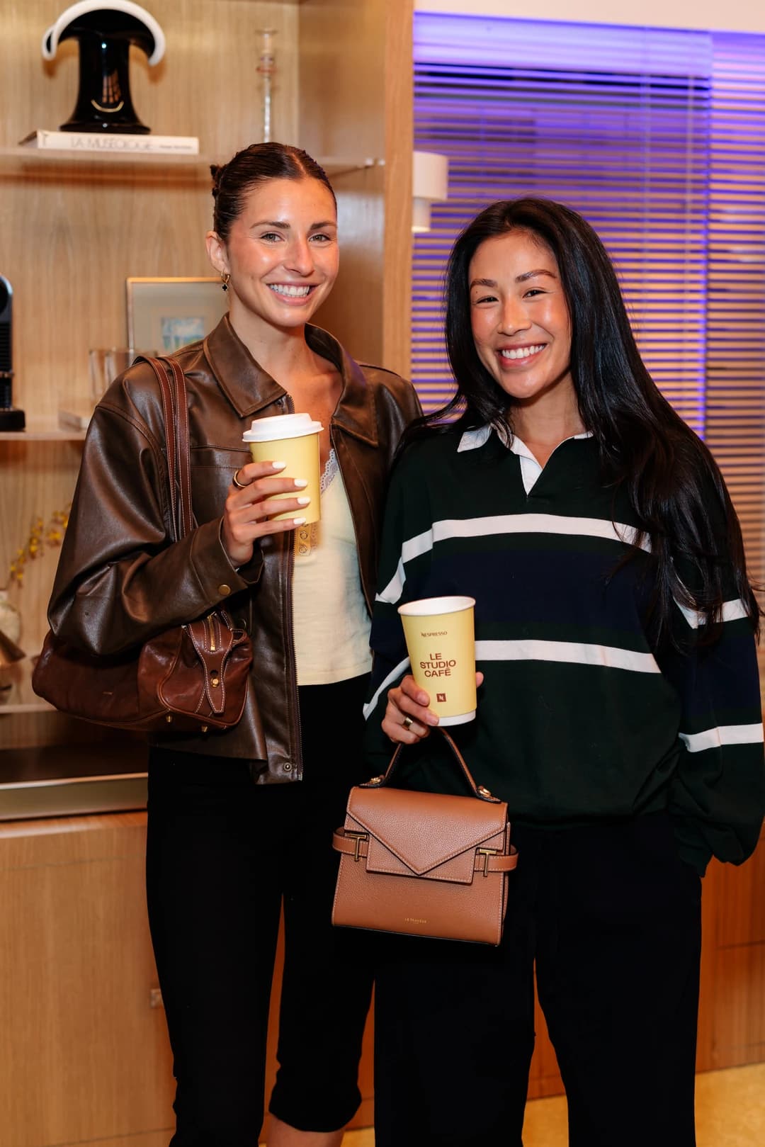 Nespresso Le Studio Café — Two guests, warm light